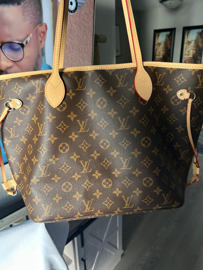 Luxury inspired oversized everyday tote bag with matching pouch.